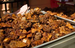 "Alejandro Ruiz market tour bits of pork"