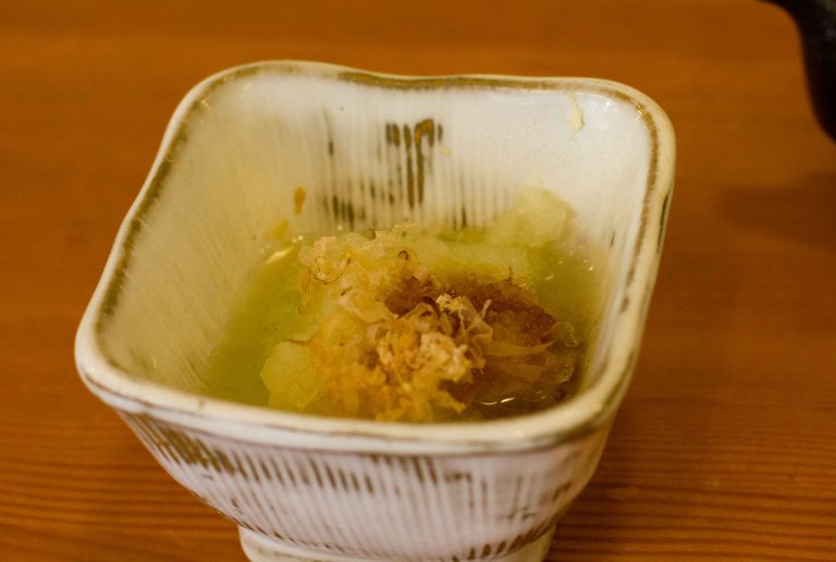 Grated daikon topped with a bit of soy sauce served to start. I've never thought to eat daikon straight like this, but I like it.