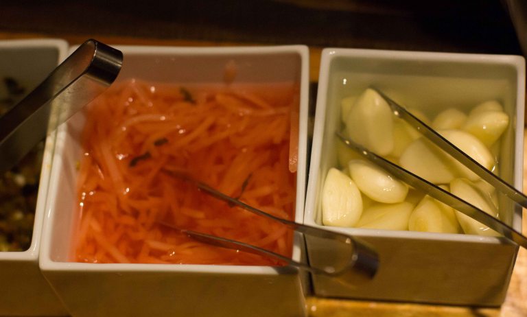 Shoga (pickled ginger) and whole cloves of garlic