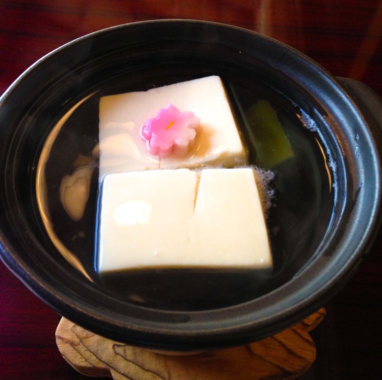 I was told that when the tofu started to dance in the pot that's when it was ready to eat.