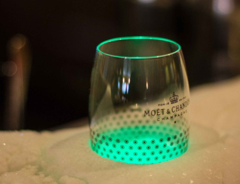 Loved the champagne flutes, lit in vibrant hues, held in ice at the bar.