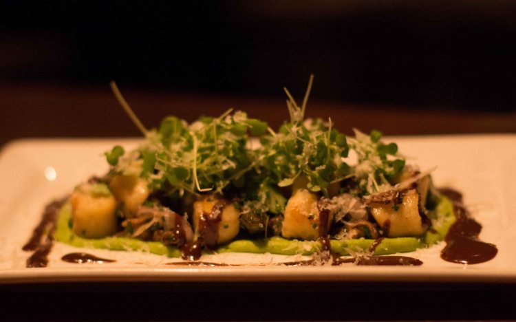 Sheep Cheese Gnocchi, pea purée, asparagus, mushrooms, black garlic