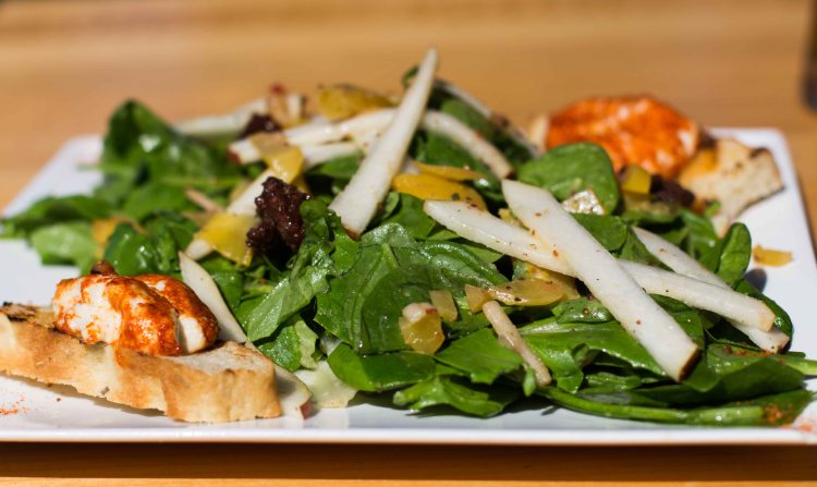 IRST SURF PISTACHIO WALNUT CRUSTED GOAT CHEESE SALAD - $13 arugula, mixed greens, local pea shoots, okanagan apple slices organic baby beets, candied pecans cassis & pear vinaigrette