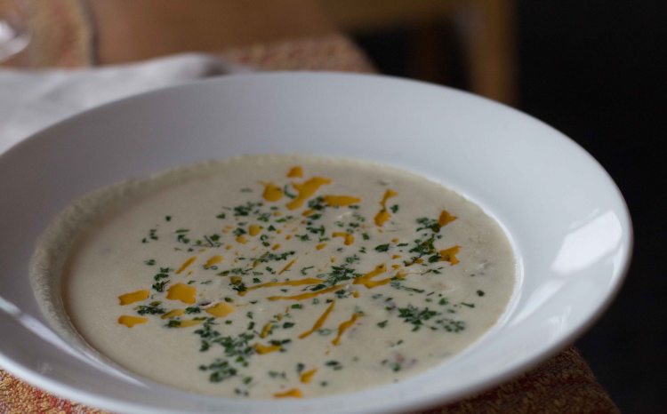 West Coast Clam Chowder with wild sidestripe shrimp, fish, corn and potatoes.