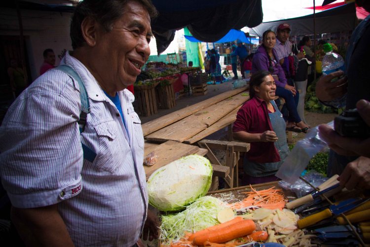 We were drawn to this man walking around with a tv tray topped with shredded veggies. As soon as we showed interest he put his table down and started his presentation. 