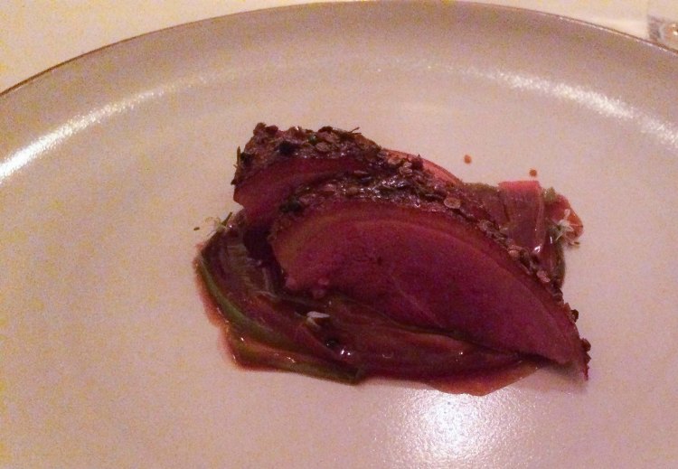 Roasted duck with lavendar honey, rhubarb and spring onion.
