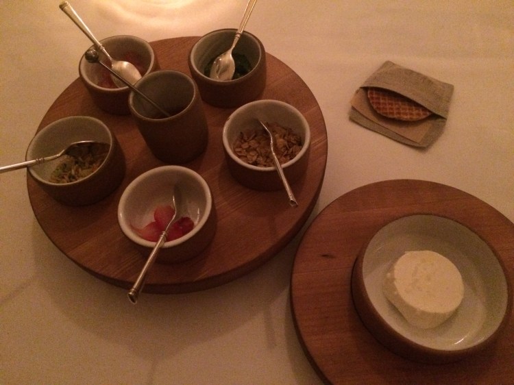 Farmer's cheese "sundae" with honey, rhubarb, sorrel and oats.